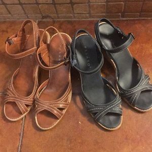Two pairs of Pesaro cork wedge sandals.